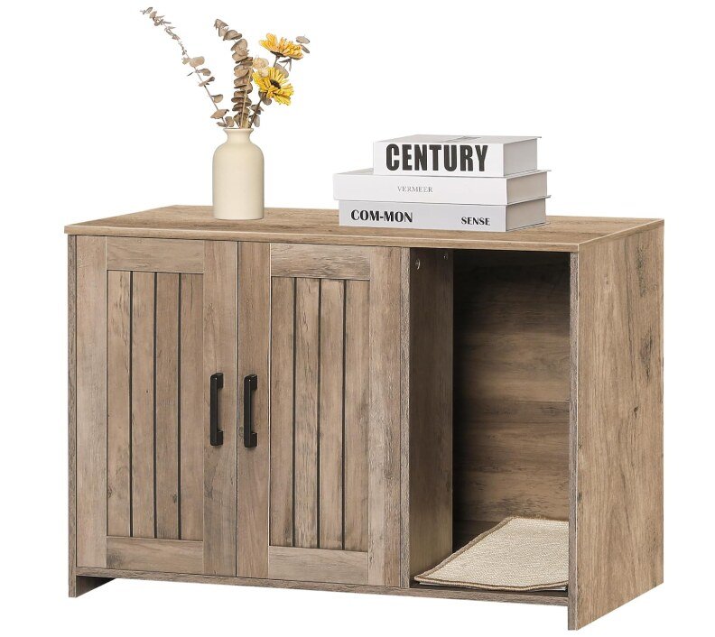 Wood cabinet-style litter box enclosure with storage doors and a scratching mat entrance, manufacturer product photo
